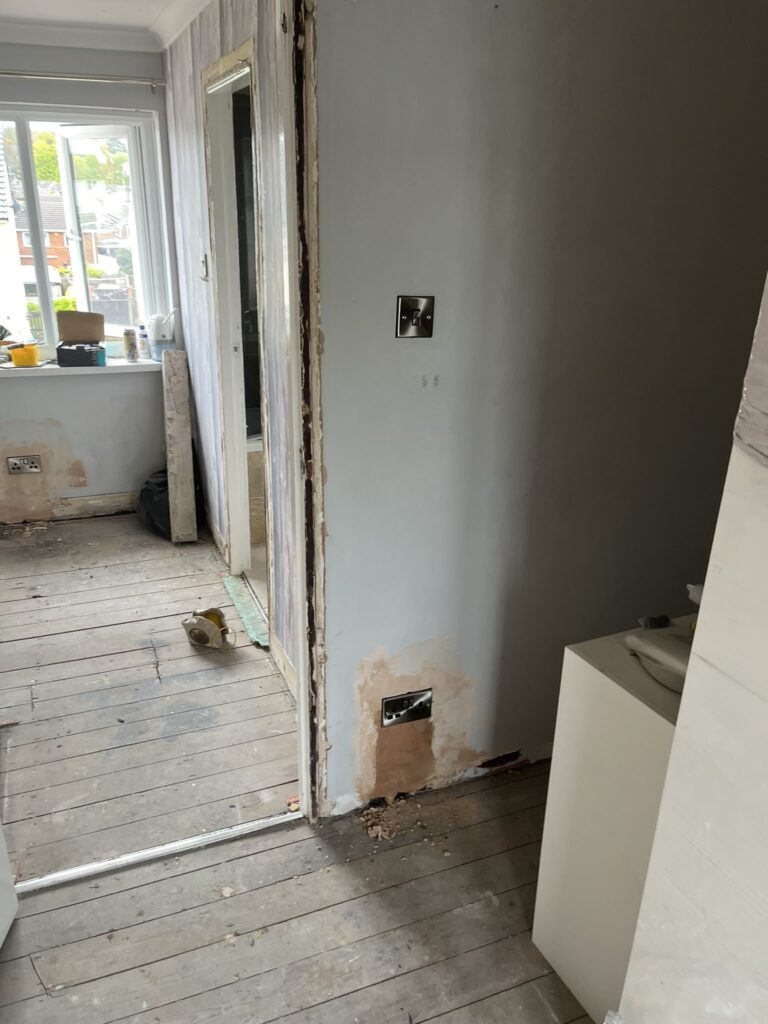 Electric-Cal Solutions electrician rewiring home.
